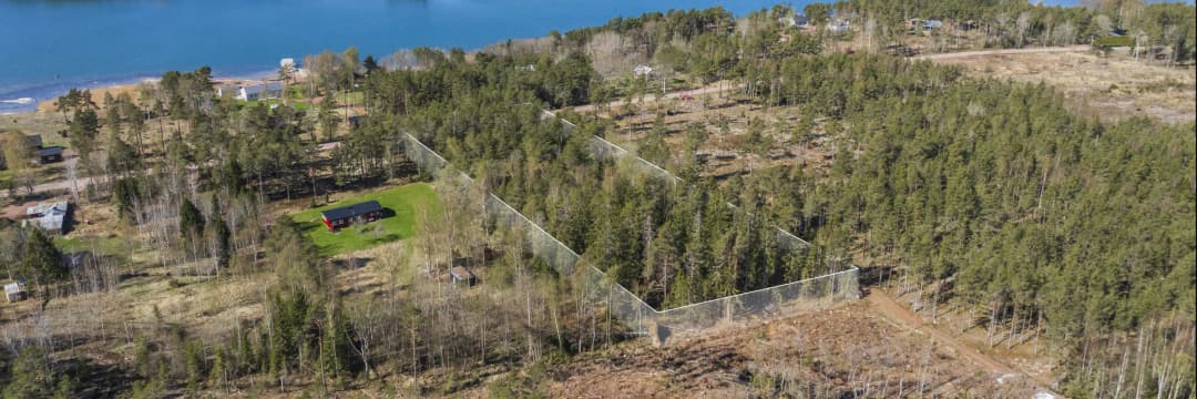 Bild av Strandnära tomtmark med båtplats